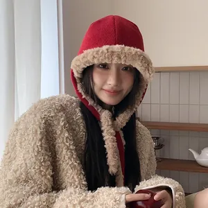 Fashionable winter red knit Lei Feng hat featuring cozy beige plush trim and ear flaps