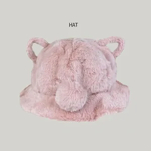 Cute pink fuzzy bucket hat featuring plush bear ears and a pom-pom for winter