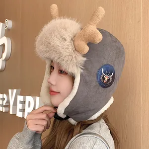Stylish winter trapper hat for women featuring reindeer antlers and thick faux fur lining