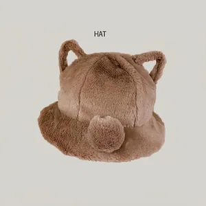 Detailed macro view of a cute brown plush bucket hat with bear ears and soft fur