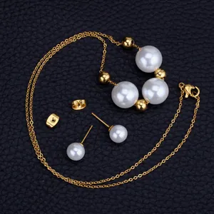 Parure élégante de bijoux en perles avec collier à billes dorées et boucles d'oreilles