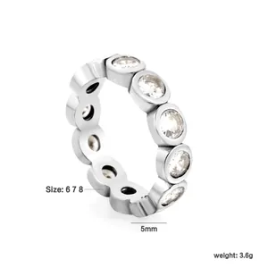 Macro view of a silver-toned eternity ring with 5mm width and cubic zirconia stones