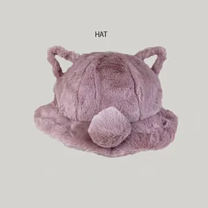Close-up of a soft mauve plush bucket hat featuring adorable cat ears and a pom-pom detail