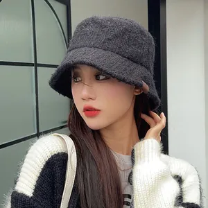 Stylish dark grey fuzzy bucket hat for women designed for autumn and winter warmth