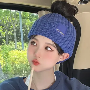 Trendy deep blue knitted winter headband with pipisweet letter patch for women