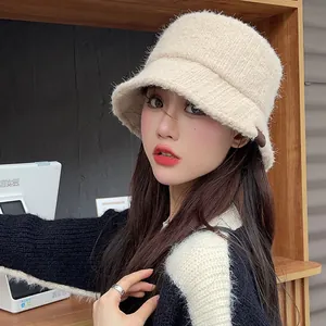 Cozy beige plush bucket hat for women, thick fuzzy warm headwear for autumn and winter.