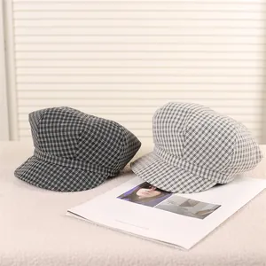 Stylish plaid newsboy baker boy hats for women in classic black and white checkers