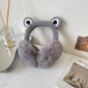 Cute grey frog plush earmuffs with big eyes providing winter ear protection and warmth