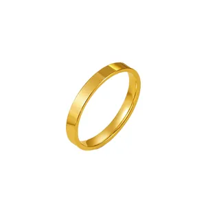 Detailed view of a minimalist 2.5mm gold plated titanium steel plain band ring for women.