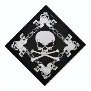 Close-up of a black cotton bandana featuring a central white skull and crossbones design