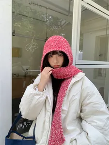 Cozy pink marled knit hooded scarf balaclava worn with white puffer jacket