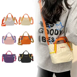 Detailed showcase of multi-colored large capacity crossbody yoga bags for summer travel