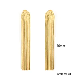 Detailed view of gold tassel earrings with 70mm length and 7g weight
