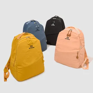 Group of large capacity Japanese style casual backpacks in yellow blue black and pink.