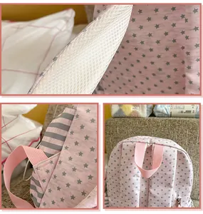Close-up detail of pink star-patterned backpack with breathable mesh back padding