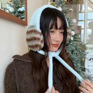 Fashionable soft light blue plush earmuffs with brown striped ear covers for winter warmth