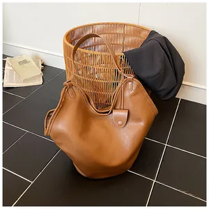 Spacious brown faux-leather hobo bag in a stylish slouchy design for everyday use