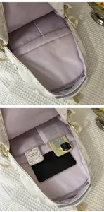 Detailed view of the large-capacity internal compartments of the casual white backpack