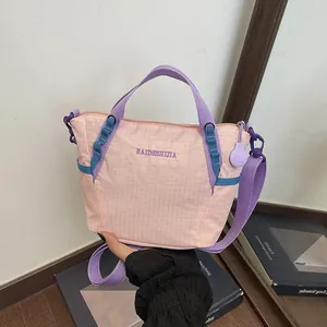Fashionable pink grid pattern large capacity crossbody bag for yoga and fitness use