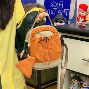 Petit sac à bandoulière orange à carreaux avec mini pochette triangulaire assortie