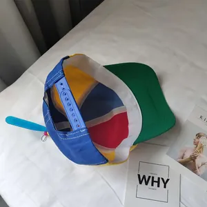 Interior view of kids colorful patchwork baseball cap with rotary propeller topper