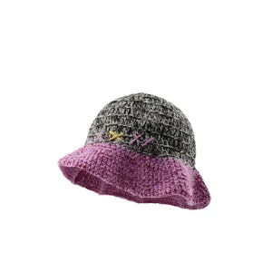 Chic handmade knitted bucket hat in mixed grey and purple color block design for winter
