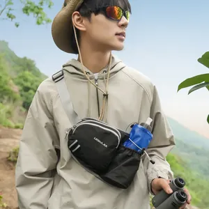 Outdoor lifestyle detail of a black hiking crossbody bag with water bottle compartment