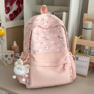 Pink cartoon backpack for teen girls with sweet pony patterns in a lifestyle setting