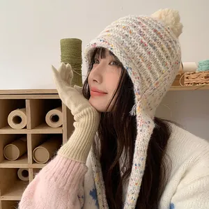 Cozy Korean style winter candy pom-pom knit hat with earflaps and matching gloves