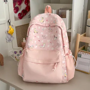 Detailed shot of pink cartoon pony backpack in a sweet aesthetic desk setting