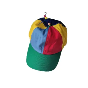 Vibrant multi-color patchwork kids baseball cap featuring a fun rotating propeller on top
