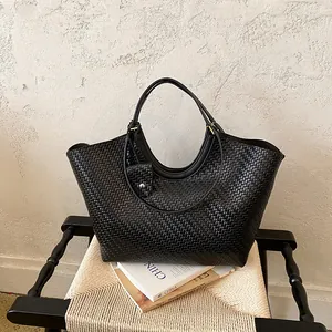 Large capacity black woven shoulder tote bag for women with minimalist Korean style