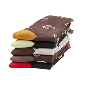 Stack of trendy mid-calf cotton socks with coffee cup patterns in various colors