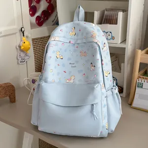 High quality cute light blue Japanese style school backpack with cartoon pony print on desk
