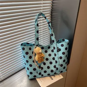 Stylish large capacity light blue polka dot tote bag with cute brown teddy bear charm