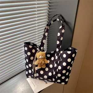 Large capacity black and white polka dot canvas tote bag featuring a cute bear plush charm