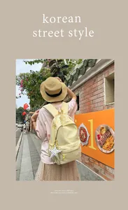 Modischer hellgelber Damenrucksack mit Sternanhänger im koreanischen Streetstyle