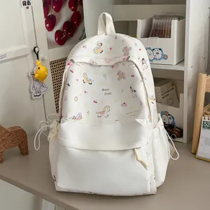 Detail view of a white Japanese style cartoon pony print backpack for student daily travel