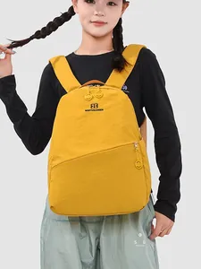 Yellow Japanese style sports backpack with large capacity for school and outdoor use