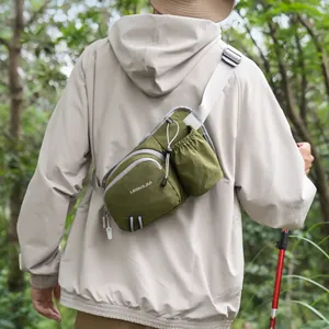 Outdoor green crossbody chest bag with integrated water bottle holder for hiking details