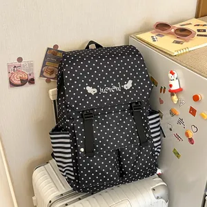 Stylish black star pattern backpack with striped side pockets for casual daily use