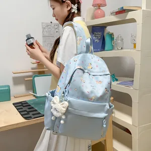 Light blue Japanese style cartoon backpack with cute pony pattern shown on a model