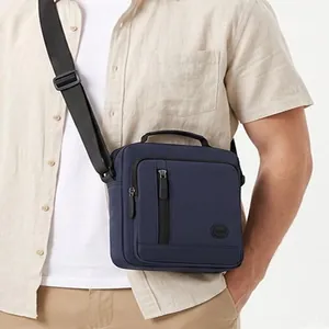 Classic navy blue waterproof messenger bag for men with adjustable crossbody shoulder strap