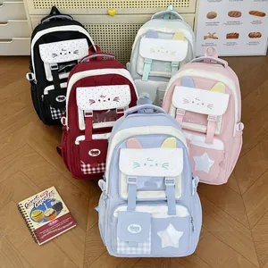 Lindas mochilas escolares estilo coreano con orejas de gato y parches de estrellas de colores.