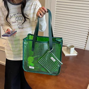 Large capacity green mesh tote bag with matching pouch for stylish daily use