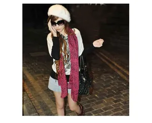 Stylish women's white fuzzy rabbit hair beret hat worn in an outdoor street setting