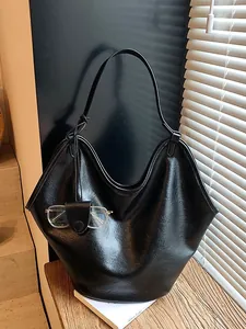 Trendy large capacity black hobo shoulder bag with lazy style and unique glasses holder strap