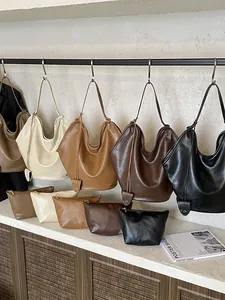 Minimalist large capacity faux leather underarm tote bag in stylish earth tones