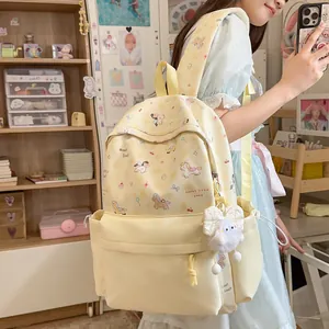 Sweet Japanese style light yellow backpack with cartoon pony print worn by model