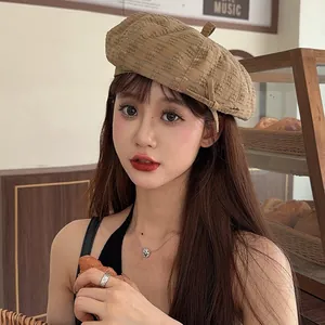 Vintage Japanese style khaki beret with frayed edges for a chic street look